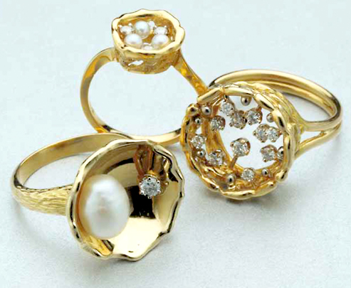 Selection of rings in 18ct yellow gold John Donald, Selection of rings in 18ct yellow gold showing smaller variants of the crown design